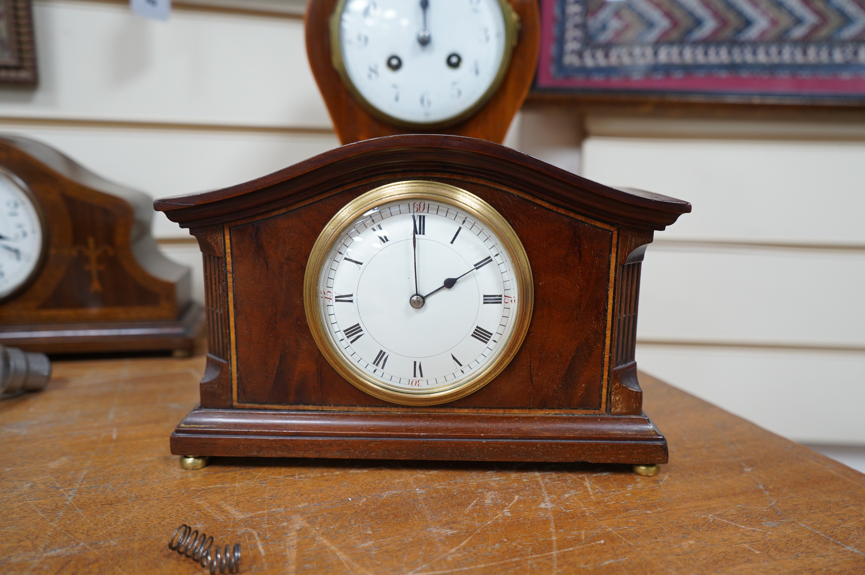 Sundry items to include four Edwardian inlaid mantel clocks, a barometer and a skeleton clock (7). Condition - mostly fair, untested